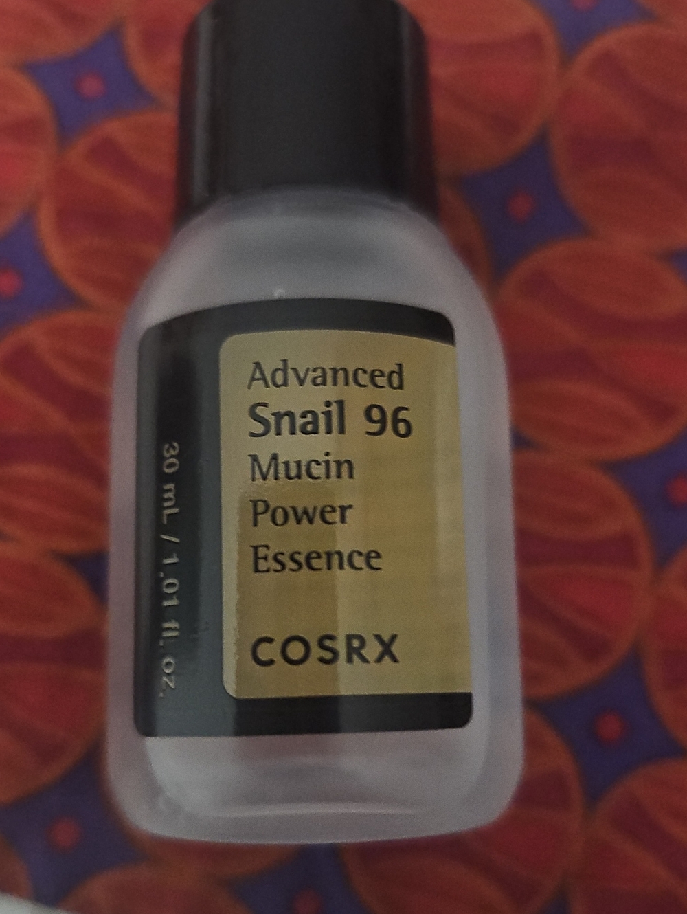 COS Clear Bottle with Gold and Black Label